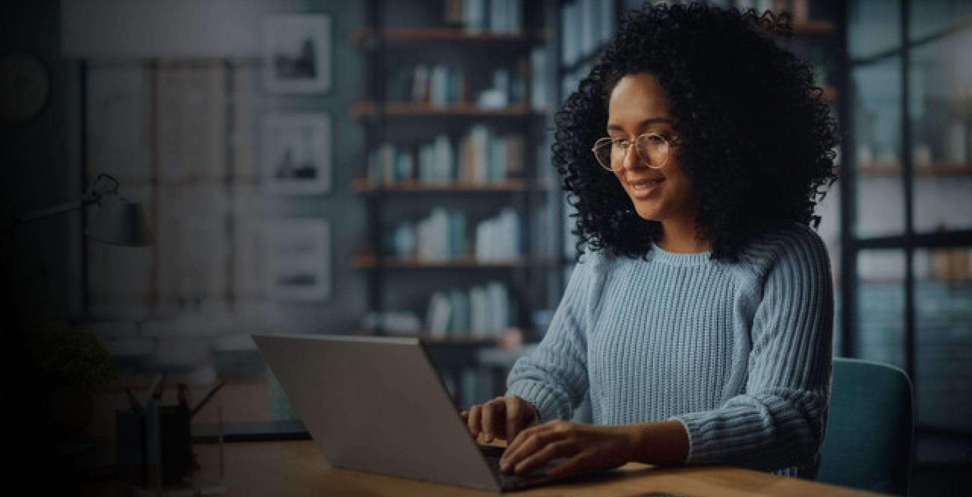 A woman working on a laptop